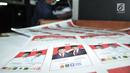 Surat suara Pilpres 2019 terlihat saat pencetakan perdana di PT Aksara Grafika Pratama, Jakarta, Minggu (20/1). KPU memberikan kepercayaan PT Aksara Grafika Pratama untuk mencetak kebutuhan surat suara 72,35 juta lembar. (Merdeka.com/Iqbal S. Nugroho)