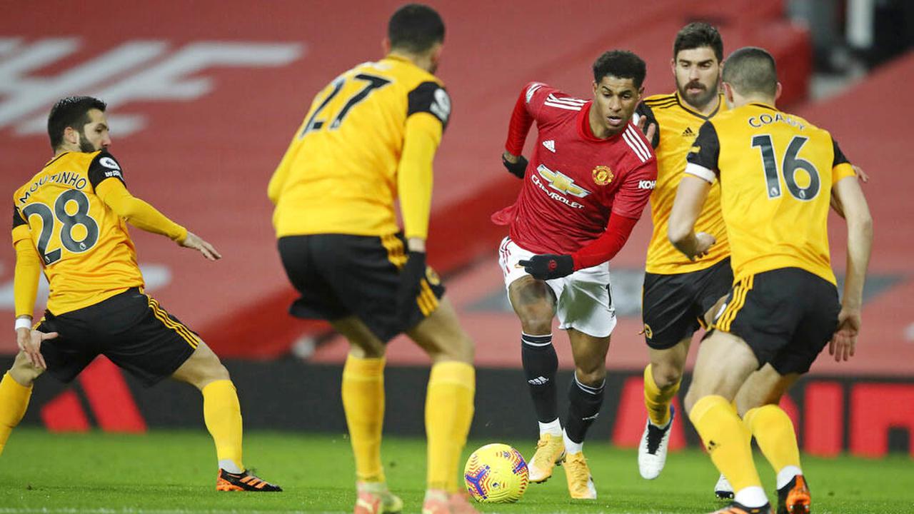 Foto Liga Inggris: Aksi Menawan Marcus Rashford Saat Menjadi Penentu Kemenangan Manchester United Atas Wolves