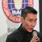 Pebulutangkis Malaysia, Lee Chong Wei (36) mengumumkan pensiun melalui konferensi pers di Putrajaya, Kamis (13/6/2019). Setelah berkarier selama 19 tahun di dunia bulu tangkis, Lee Chong Wei akhirnya memutuskan untuk menggantung raket alias pensiun. (AP Photo/Vincent Thian)