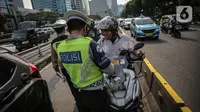 Namun, kebijakan ini hanya dilakukan di wilayah yang tak terjangkau Electronic Traffic Law Enforcement (ETLE). (Liputan6.com/Faizal Fanani)