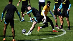 Inter sendiri lolos ke fase ini usai mengeliminasi rival lokal Benfica, Porto, di babak 16 besar. (Photo by GABRIEL BOUYS / AFP)