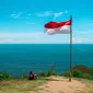Ilustrasi bendera Merah Putih, Indonesia, semangat patriotisme. (Photo by Anggit Rizkianto on Unsplash)