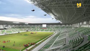 Presiden Joko Widodo (Jokowi) meresmikan selesainya pembangunan Stadion Utama Sumatera Utara yang terletak di Desa Sena, Kecamatan Batang Kuis, Kabupaten Deli Serdang, Sumatera Utara, Selasa (15/10/2024). Stadion Utama Sumatera Utara dibangun di atas lahan 48.420 m2 dan luas bangunan 27.452 m2 dengan kapasitas penonton 25.750 orang. Stadion ini terdiri dari 3 lantai dan lantai tribun yang terbagi untuk penonton VIP 365 unit, media 224 unit, reguler 25.115 unit, dan difabel 46 unit. (Dok. Kementerian PUPR)