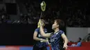 Pebulutangkis Indonesia, Greysia Polii / Apriyani Rahayu, mengembalikan kok saat melawan pasangan Bulgaria pada Indonesia Masters 2019 di Istora Senayan, Jakarta, Rabu (23/1). Greysia / Apriyani lolos ke babak kedua. (Bola.com/M. Iqbal Ichsan)