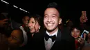 Untuk presenter sekaligus pelawak yang satu ini memang sudah sangat senang saat mendapat undangan dari Presiden Jokowi. Ruben Onshu, di tengah kesibukannya akhirnya datang ke Solo untuk acara pernikahan ini. (Adrian Putra/Bintang.com)