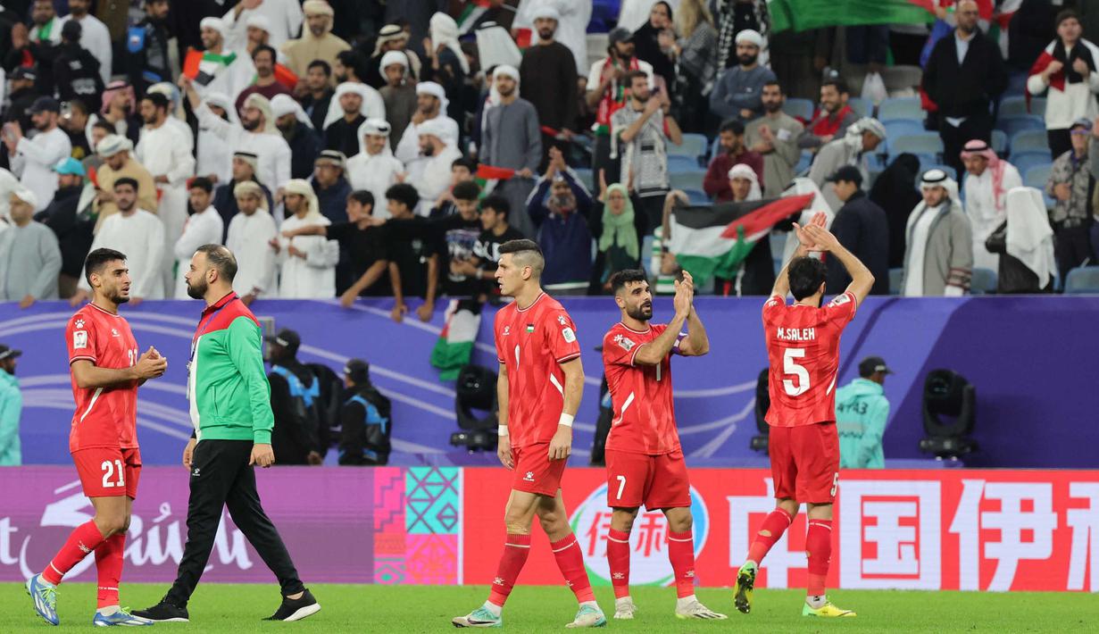 Palestina berhasil merebut satu poin dalam laga ini. (Giuseppe CACACE/AFP)