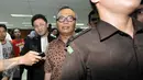 Mantan Kepala Sarana dan Prasarana Dinas Pendidikan Menengah Jakarta Barat, Alex Usman usai menjalani sidang perdana pembacaan dakwaan terkait dugaan korupsi pengadaan UPS di Pengadilan Tipikor, Jakarta, Kamis (29/10/2015). (Liputan6.com/Helmi Afandi)