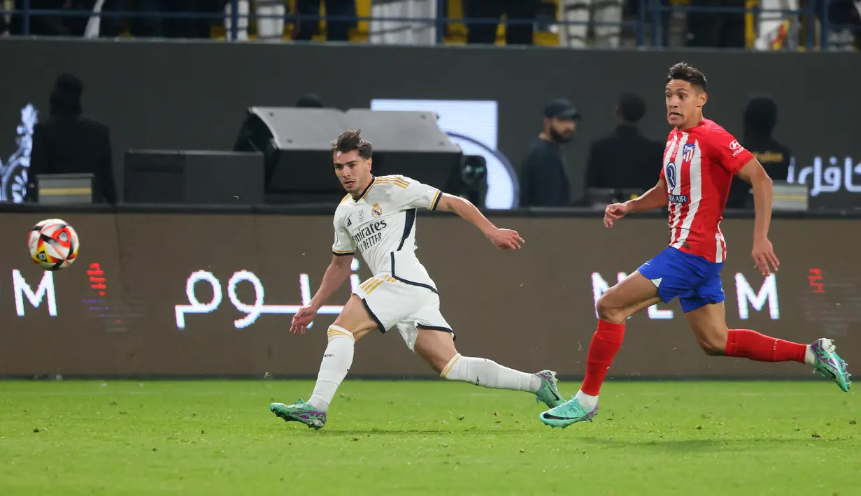 Lima gol Real Madrid masing-masing dicetak Antonio Rudiger dan Ferland Mendy di babak pertama, Dani Carvajal di babak kedua, serta bunuh diri Stefan Savic dan aksi Brahim Diaz di masa extra time. (Fayez NURELDINE / AFP)