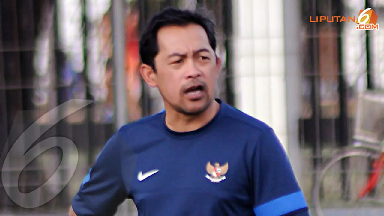 aji-santoso-timnas-130618c.jpg