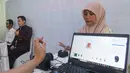 Program jemput bola ini memberikan kemudahan bagi masyarakat untuk mengurus dokumen keimigrasian tanpa harus datang langsung ke kantor imigrasi. (merdeka.com/Arie Basuki)