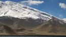 Pemandangan Gunung Muztagata di Dataran Tinggi Pamir, Daerah Otonom Uighur Xinjiang, China barat laut, 16 Juni 2020. (Xinhua/Hu Huhu)