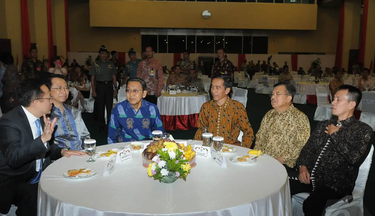 Jokowi dan JK kompak mengenakan batik saat menghadiri acara Hut DPD yang ke-10, di Gedung Nusantara IV DPR RI, Senayan, Jakarta, Senin (29/9/2014) (Liputan6.com/Herman Zakharia)