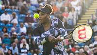 Pemain Amerika Serikat, Serena Williams berusaha mengembalikan bola menuju petenis ganda putri Sara Sorribes Tormo dari Spanyol dan Marie Bouzkova dari Republik Ceko saat putaran 8 pertandingan tenis ganda putri, yang ia mainkan dengan Ons Jabeur Tunisia pada hari ketiga turnamen tenis Eastbourne International di Eastbourne, Inggris pada 21 Juni 2022. (AFP/Glyn Kirk)