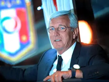 Coach of the Italian national football team Marcello Lippi watches after his team arriving at Sofia airport on October 10, 2008, ahead of Saturday's World Cup qualifier against Bulgaria. AFP PHOTO / DIMITAR DILKOFF