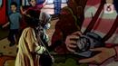 Warga melintasi kawasan terowongan Kendal, Jakarta saat jam pulang kerja, Selasa (28/9/2021). Juru Bicara Satgas Penanganan Covid-19, Wiku Adisasmito menyebut Indonesia perlu meningkatkan kewaspadaan guna mencegah terjadinya gelombang ketiga Covid-19. (Liputan6.com/Helmi Fithriansyah)