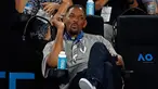 Ekspresi aktor AS Will Smith saat menonton pertandingan putaran ketiga antara petenis Prancis Jo-Wilfried Tsonga melawan petenis Australia Nick Kyrgios di Australia Terbuka di Melbourne, Australia (19/1). (AP Photo / Ng Han Guan)