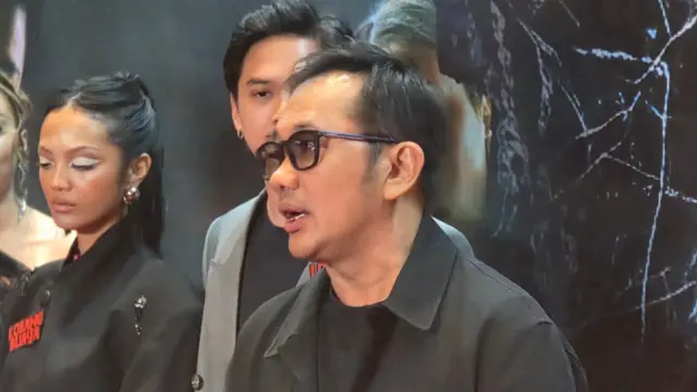 Hanung Bramantyo dalam konferensi pers Film Lobang Buaya. (Ratnaning Asih/ Liputan6.com)