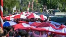 Kegiatan ini juga bertujuan untuk menumbuhkan rasa cinta tanah air dan semangat nasionalisme di kalangan masyarakat, terutama generasi muda. (Juni KRISWANTO/AFP)