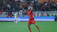 Selebrasi striker Persija Jakarta, Maxwell usai membobol gawang Dewa United dalam laga tunda pekan ke-21 BRI Super League 2025/2026 di Jakarta International Stadium, Minggu (15/3/2026). (Bola.com/M. Iqbal Ichsan)
