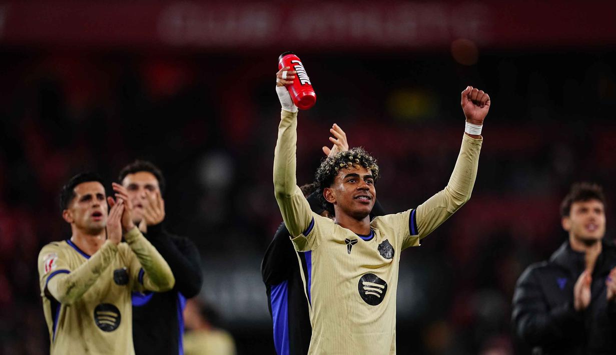 Pemain Barcelona, Lamine Yamal merayakan golnya pada pertandingan pekan ke-27 La Liga 2025/2026 melawan Athletic Bilbao di Stadion San Mames, Sabtu 7 Maret 2026 waktu setempat atau Minggu (8/3/2026) dini hari WIB. Barcelona meraih kemenangan di pertandingan pekan ke-27 La Liga 2025/2026. (AP Photo/Miguel Oses)