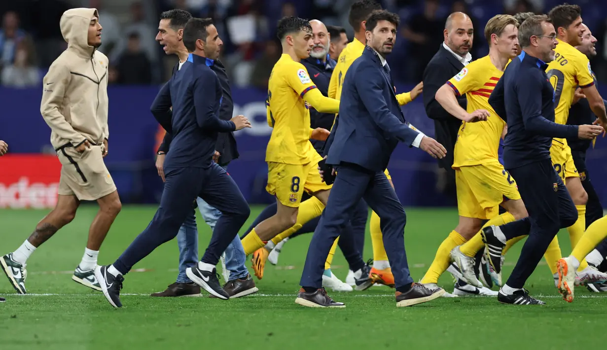 Barcelona kini unggul 14 poin dari Real Madrid di klasemen dengan nilai 85. Ini merupakan gelar LaLiga ke-27 klub Catalan. (AFP/Lluis Gene)