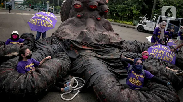 FOTO: Hari Perempuan Internasional, Massa Tuntut Pengesahan RUU TPKS