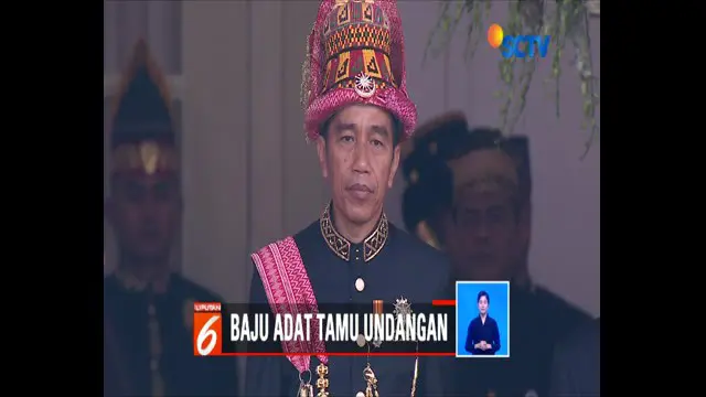 Menjadi  inspektur upacara Hari Kemerdekaan ke-73 Republik Indonesia, Presiden Jokowi kenakan pakaian adat Aceh.