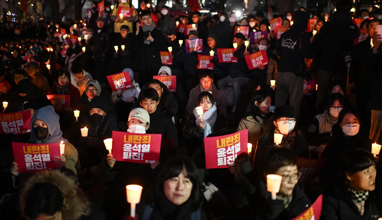 Sebelumnya, upaya Presiden Yoon Suk Yeol terkait pemberlakuan darurat militer ditolak oleh Majelis Nasional Korea Selatan karena dianggap tidak sah. (Philip FONG/AFP)