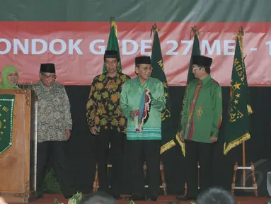 Wakil Presiden RI, Boediono, dan Gubernur DKI Jakarta, Joko Widodo, membuka Rakernas Perangkat Muslimat NU, Rabu (28/5/14). (Liputan6.com/Herman Zakharia)
