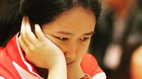 Jangan ragukan prestasi GM Irene Sukandar di dunia catur internasional. Ia menjadi andalan Indonesia dan sudah raih banyak gelar. Salah satu prestasi bergengsi yang diraih Irene yakni mendapatkan medali emas 'International Chess Rapid di 27th Sea Games 2013. (Liputan6.com/IG/@irene_sukandar)