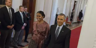 Berakhirnya masa kepemimpinan Presiden Barrack Obama berarti berakhir juga status Michelle Obama sebagai Ibu Negara. Ia pun bercerita soal perasaannya ketika harus meninggalkan White House. (AFP/Bintang.com)