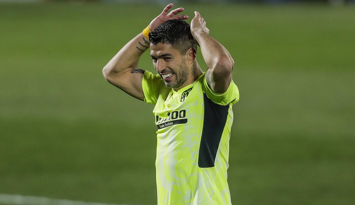 Ekspresi striker Atletico Madrid, Luis Suarez, saat melawan Getafe pada laga Liga Champions di Stadion Alfonso Perez, Sabtu (13/3/2021). Kedua tim bermain imbang 0-0. (AP/Manu Fernandez)