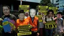 Tampak beberapa topeng para terpidana korupsi, di antaranya adalah topeng terpidana korupsi Hartati Murdaya dan Anggodo Widjojo, Jakarta, (22/9/14). (Liputan6.com/Johan Tallo)