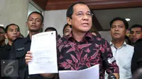 Anggota F-Partai Nasdem DPR Akbar Faizal memberikan keterangan pers terkait penonaktifan dirinya sebagai anggota MKD jelang putusan kasus pelanggaran kode etik Ketua DPR Setya Novanto di Senayan, Jakarta, Rabu (16/12/2015). (Liputan6.com/Johan Tallo) 