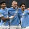 Penyerang Manchester City, Erling Haaland (tengah), merayakan gol kedua timnya dalam pertandingan Liga Champions UEFA antara Manchester City dan Borussia Dortmund di Stadion Etihad, Manchester, Inggris barat laut, pada 5 November 2025. (Oli SCARFF / AFP)