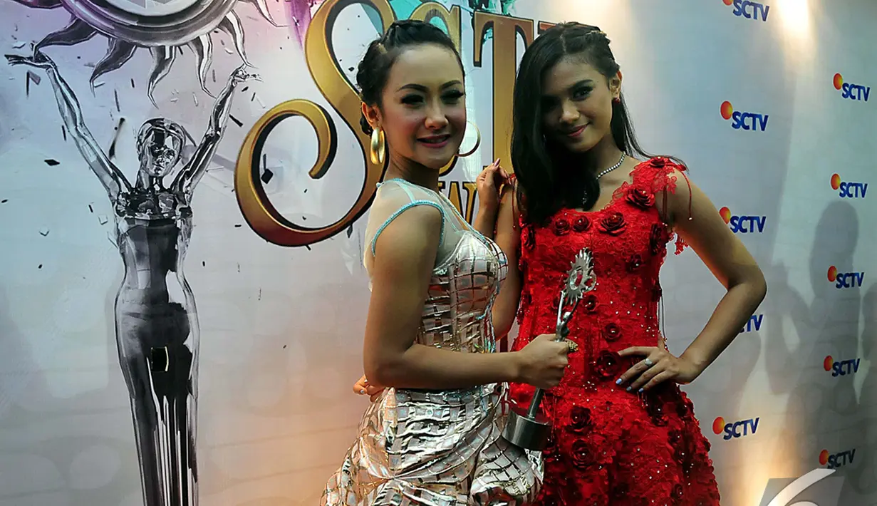 Lagu Cita Citata (kiri) "Sakitnya Tuh Disini" jadi Soundtrack Paling Ngetop. Foto diambil pada Sabtu (29/11/2014). (Liputan6.com/Johan Tallo)