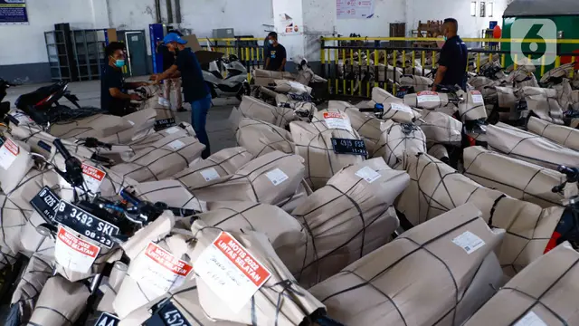 FOTO: Pengiriman Ribuan Sepeda Motor Gratis Selama Mudik Lebaran 2022