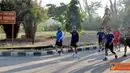 Citizen6, Surabaya: Komandan Pasmar-1 Kolonel Marinir R. Gatot Suprapto melaksanakan olahraga bersama Perwira Pasmar-1 di Trian Sutedi Senaputra Karang Pilang Surabaya, Selasa (4/9). (Pengirim: Roby Eka Sanjaya)