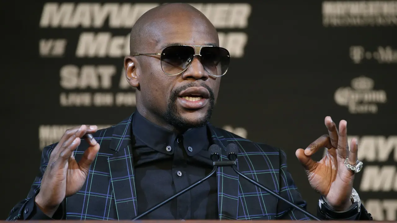Floyd Mayweather, Conor McGregor, Tinju Dunia