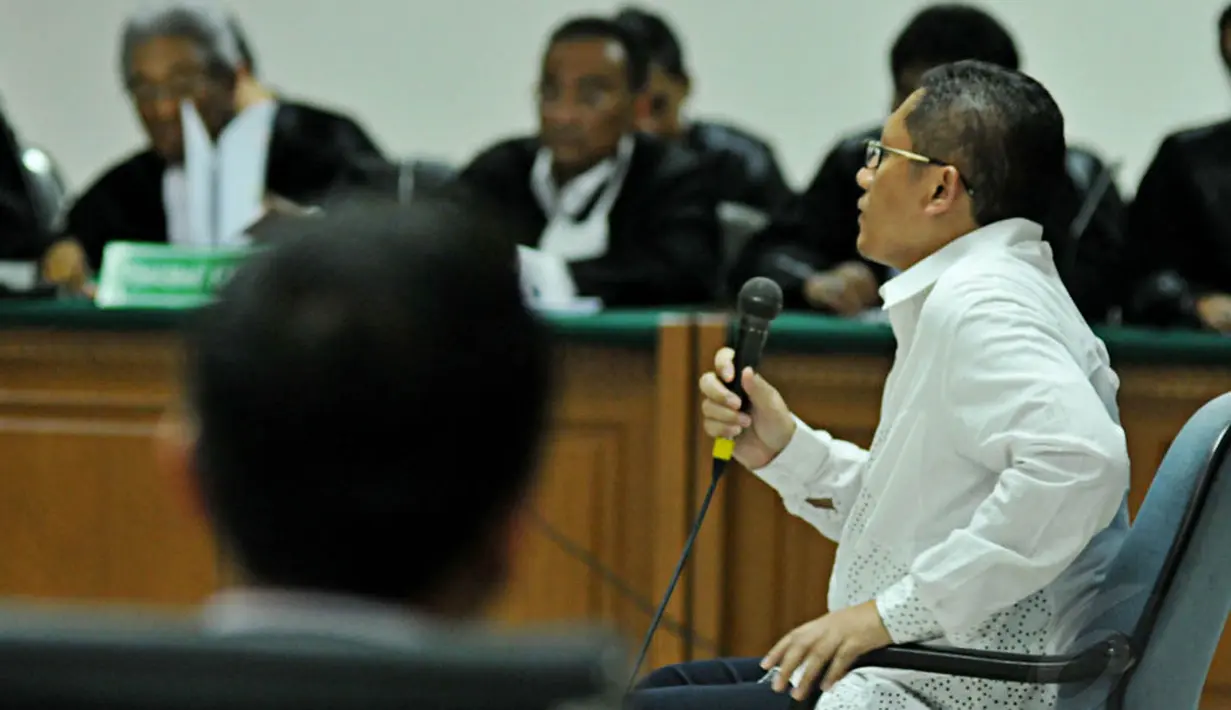 Dalam sidang tersebut, Anas Urbaningrum didakwa telah menerima dua mobil dan uang miliaran rupiah sebagai imbalan atas pengurusan beberapa proyek-proyek pemerintah, Jakarta, Jumat (30/5/14). (Liputan6.com/Johan Tallo)