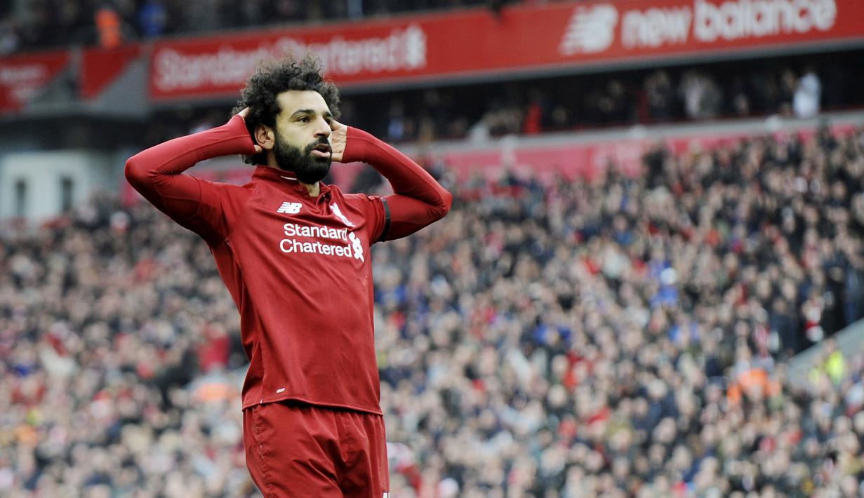 5. Mohamed Salah (Liverpool) - Pemain andalan Timnas Mesir ini berada di urutan kelima, pendapatan penyerang The Reds ini sebesar 37 juta dollar atau Rp 551 miliar. (AP/Rui Vieira)