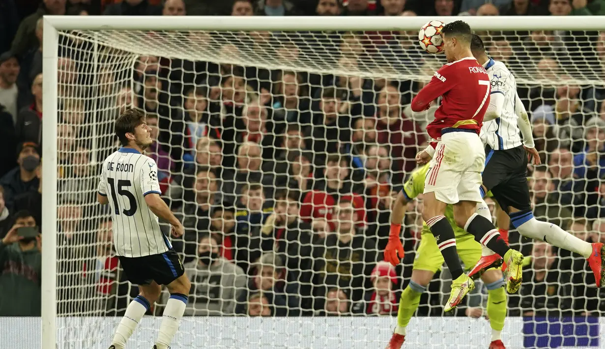Gol-gol Setan Merah dicetak oleh Marcus Rashford, Harry Maguire  dan sang megabintang Cristiano Ronaldo yang mengantarkan MU menutup laga dengan kemenangan 3-2. (AP/Dave Thompson)