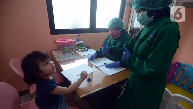 FOTO: Memantau Pertumbuhan Balita Lewat Imunisasi Rutin