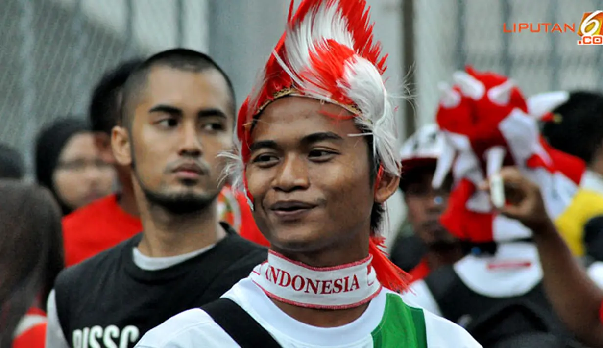 
Suporter Laga Pertandingan Piala AFF Suzuki 2012 antara Malaysia vs Indonesia di Stadion Bukit Jalil, Kuala Lumpur, Malaysia, pada 1 November 2012.