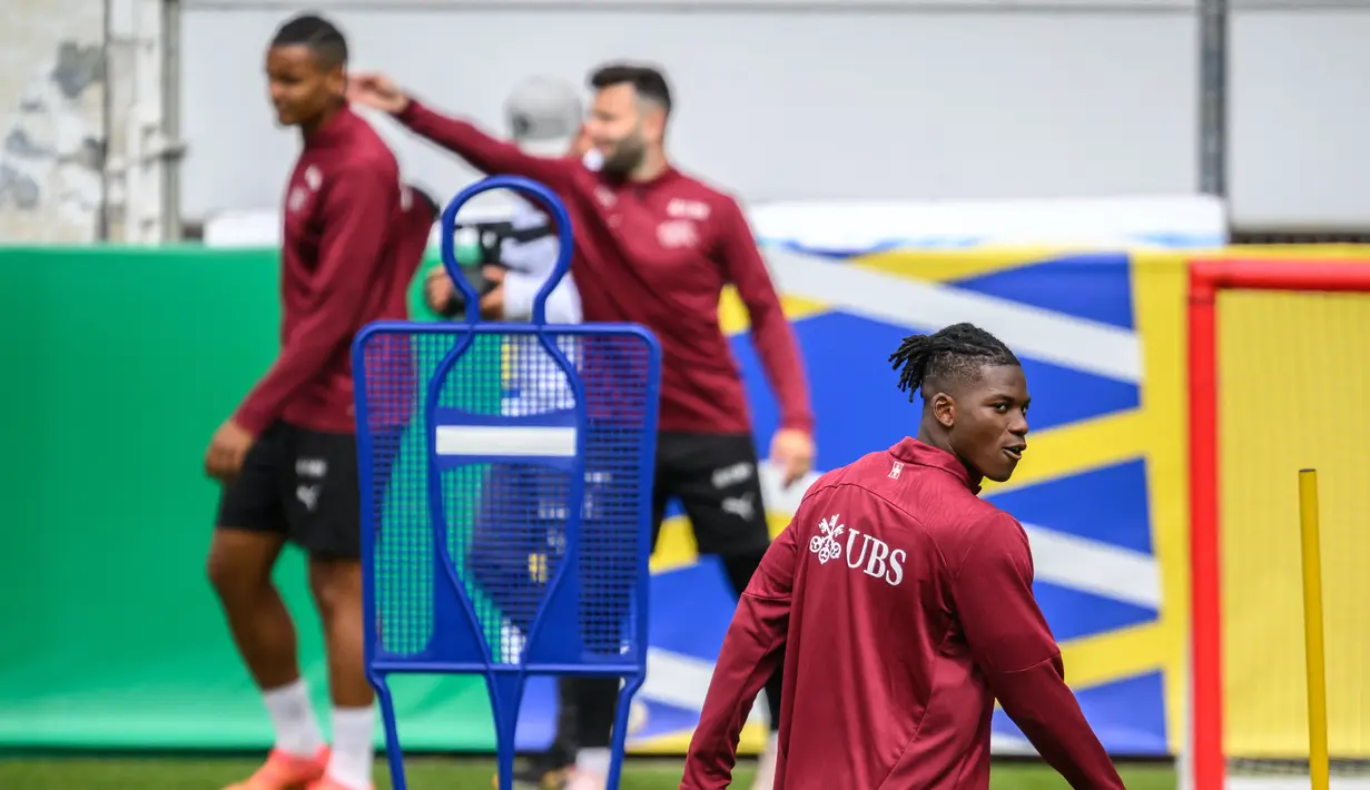 Kuda hitam Swiss akan berduel dengan Inggris, finalis Euro 2020, pada perempat final Piala Eropa 2024 di Merkur Spiel-Arena, Sabtu (6/7/2024) malam WIB. (Fabrice COFFRINI / AFP)