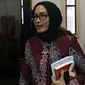 Komisioner KPU RI, Evi Novida Ginting jelang memberi keterangan terkait pernyataan sikap KPU RI terhadap putusan DKPP di Gedung KPU RI, Jakarta, Kamis (19/3/2020). Evi Novida Ginting menyatakan keberatan dan akan mengajukan gugatan atas putusan DKPP. (Liputan6.com/Helmi Fithriansyah)