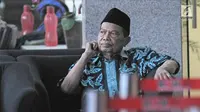 Tersangka Wali Kota Mojokerto Masud Yunus usai menjalani pemeriksaan di Gedung KPK, Jakarta, Rabu (7/2). Masud diperiksa sebagai tersangka dugaan suap pembahasan perubahah APBD pada Dinas PUPR Kota Mojokerto tahun 2017. (Liputan6.com/Herman Zakharia)
