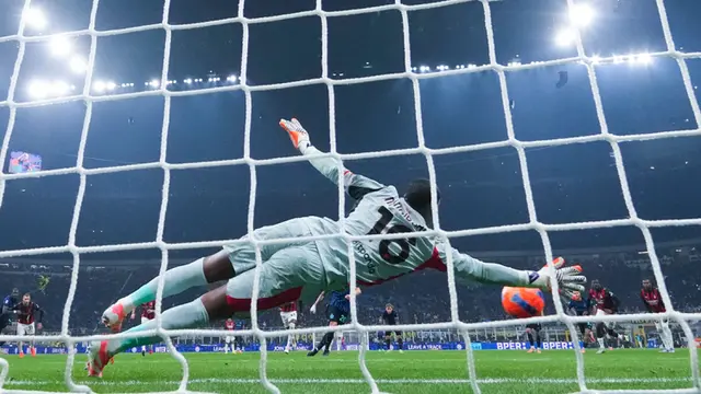 Foto: Gol Tunggal Pulisic dan Penyelamatan Gemilang Maignan Jadi Penentu Kemenangan Milan atas Inter di Liga Italia