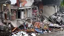 Kepala Seksi Operasi dan Siaga Kantor Pencarian dan Pertolongan Basarnas Bali, I Wayan Juni Antara, menuturkan proses evakuasi terhadap korban banjir masih terus berlangsung sejak pukul 05.00 Wita. (SONNY TUMBELAKA/AFP)