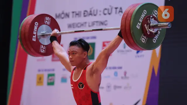Foto: Tampil Percaya Diri, Rahmat Erwin Abdullah Rebut Emas Angkat Besi di Kelas 73 kg Putra sekaligus Pecahkan Rekor SEA Games